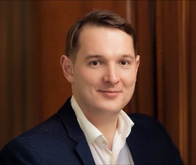 Тім Коган